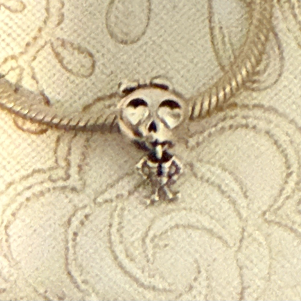 Authentic Pandora dangling silver Pandora, skeleton charm